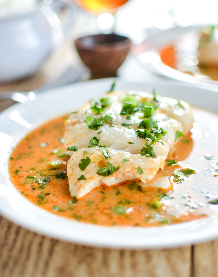 Poached Halibut in Tomato Curry Broth is a simple weeknight dinner recipe that the entire family can enjoy! #WildAlaskaSeafood #CleverGirls | www.cookingandbeer.com