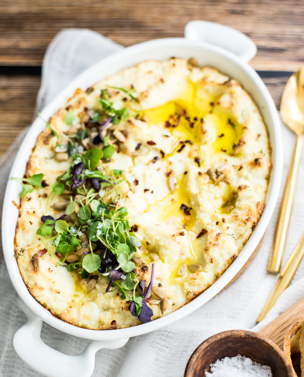 Baked ricotta cheese dip with garlic and thyme is the perfect simple and quick appetizer recipe. It's great served at a dinner party or a game day shindig!