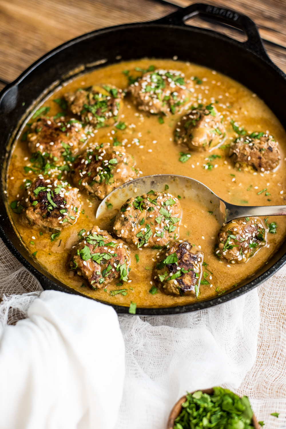 One pan turkey zucchini meatballs in Bangkok peanut sauce is the perfect weeknight meal. It is popping with texture and doesn't lack in flavor thanks to House of Tsang's Bangkok Peanut Sauce™!