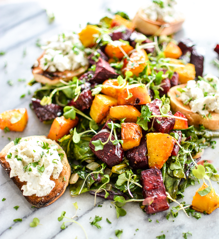 Roasted Beets and Beet Greens with Goat Cheese Crostini is the perfect appetizer, lunch or dinner salad! | www.cookingandbeer.com