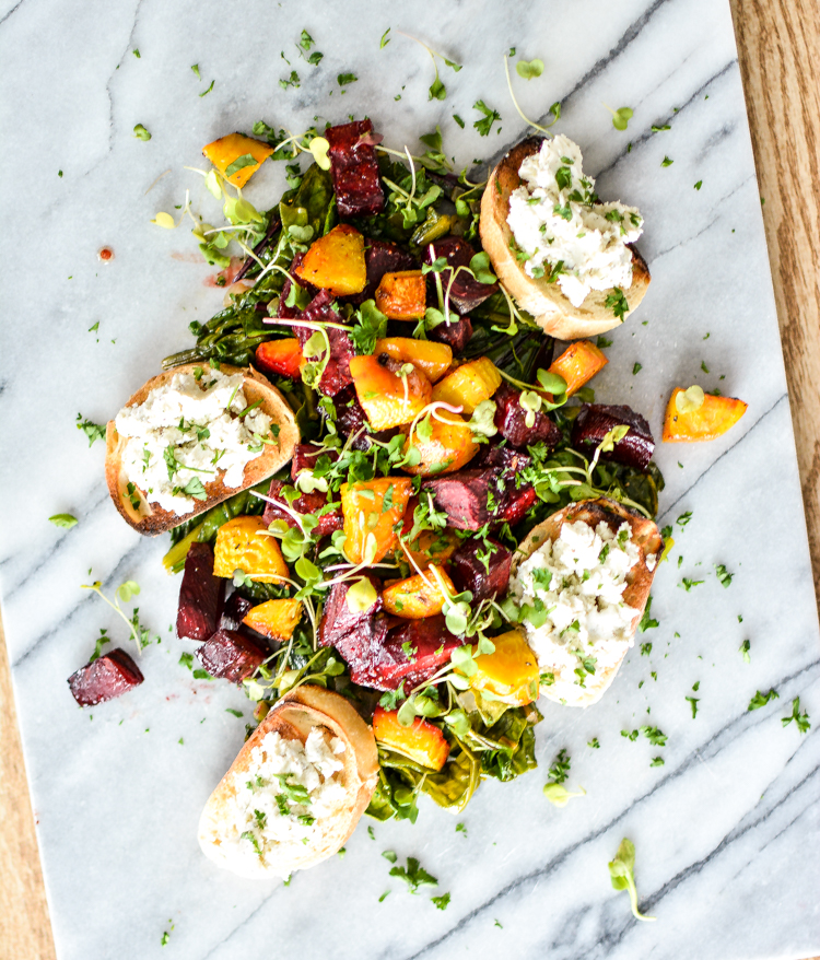 Roasted Beets and Beet Greens with Goat Cheese Crostini is the perfect appetizer, lunch or dinner salad! | www.cookingandbeer.com