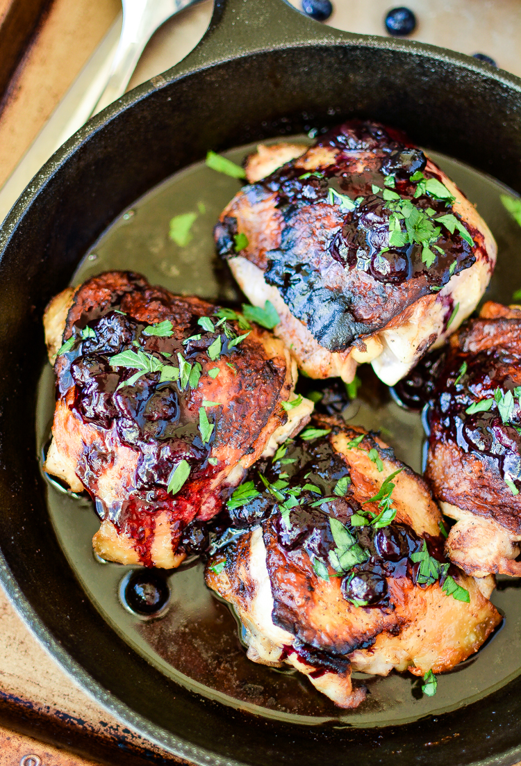 Blueberries in a savory dish is put to the test in this recipe for Crispy Chicken Thighs with Blueberry Sauce! The result: a delicious weeknight fall meal!