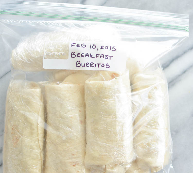 Make-Ahead, Freezer-Friendly Breakfast Burritos with Sausage, Peppers and Cheese! | www.cookingandbeer.com