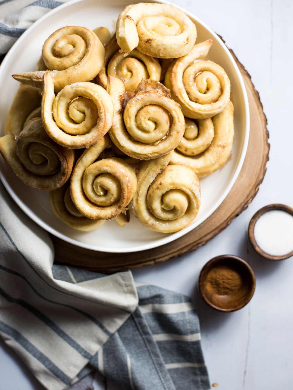 If you are a lover of homemade honey buns and love big and bold spices, these homemade cardamom honey buns are what you need for a relaxing Sunday morning!