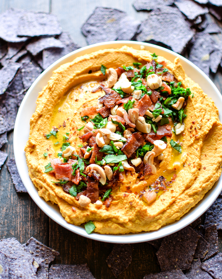 Carrot Hummus with Bacon and Cashews: Liven things up a bit with a fun twist on a classic hummus recipe!