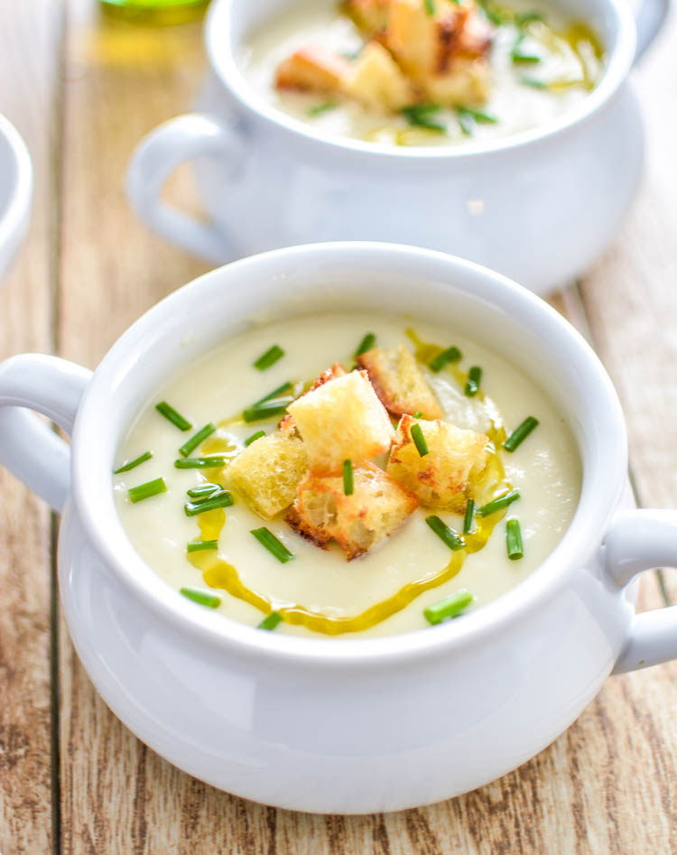 The ultimate in vegetarian comfort food: Cauliflower and Celery Root Soup with Roasted Garlic.  | www.cookingandbeer.com