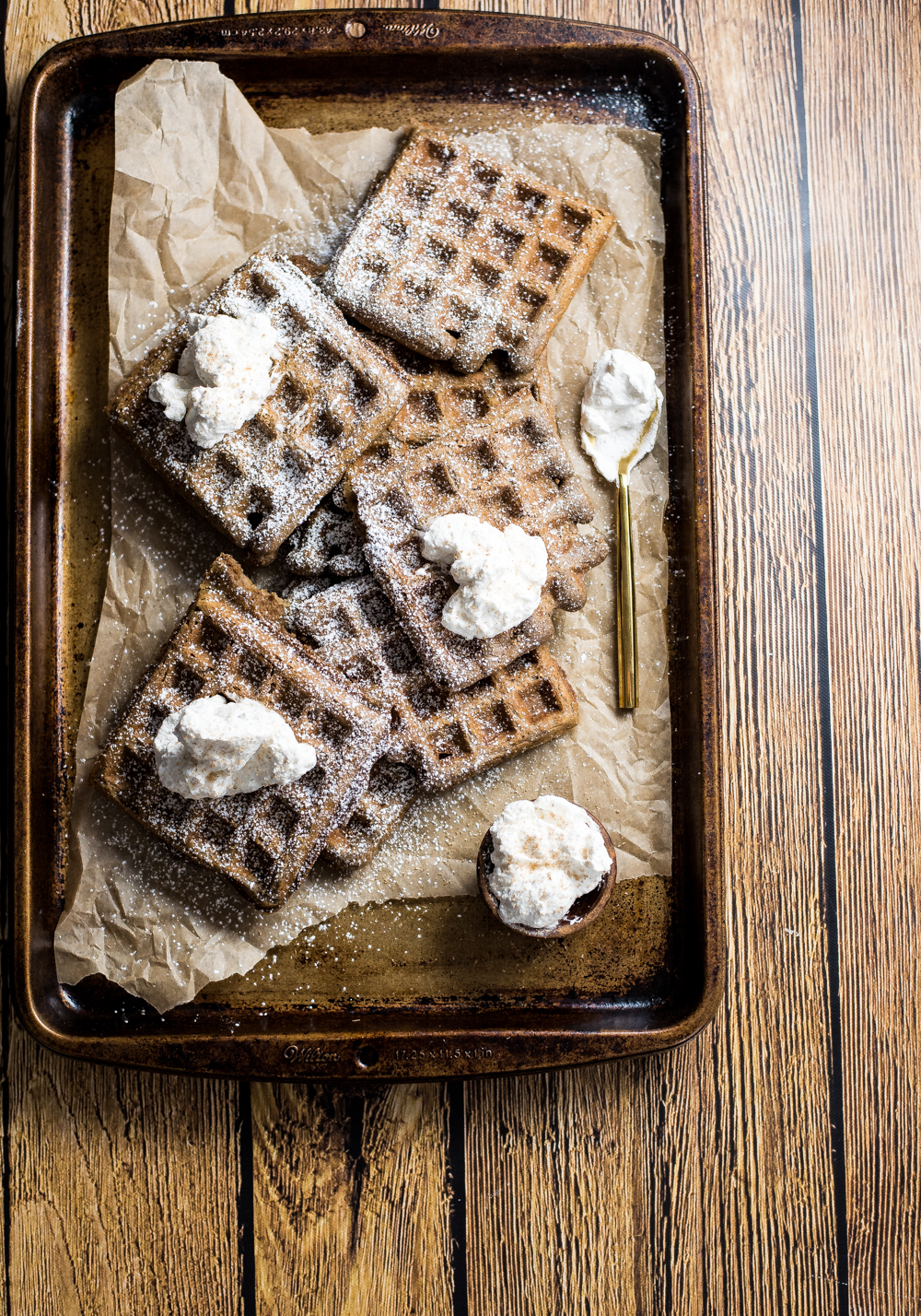 Cocoa chai buttermilk waffles with spiced whipped cream are the perfect weekend brunch recipe! They are comforting and delicious!