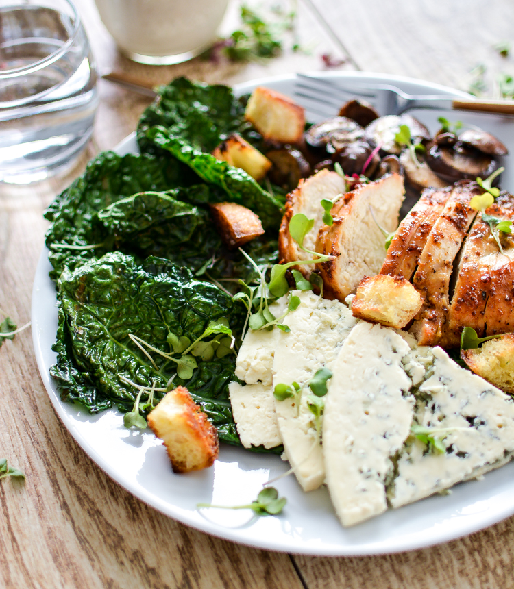Charred Kale Caesar Salad with Honey Chipotle Chicken is a fun twist on a traditional caesar salad, using kale instead of romaine! | www.cookingandbeer.com