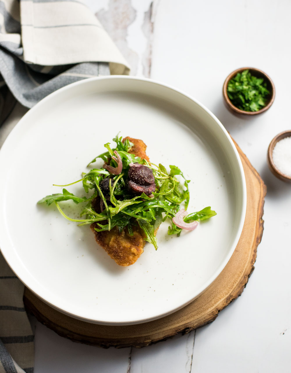 Lighter pan-fried chicken breast with cherry and arugula salad is the perfect weeknight meal that is light, nutritious, and delicious!