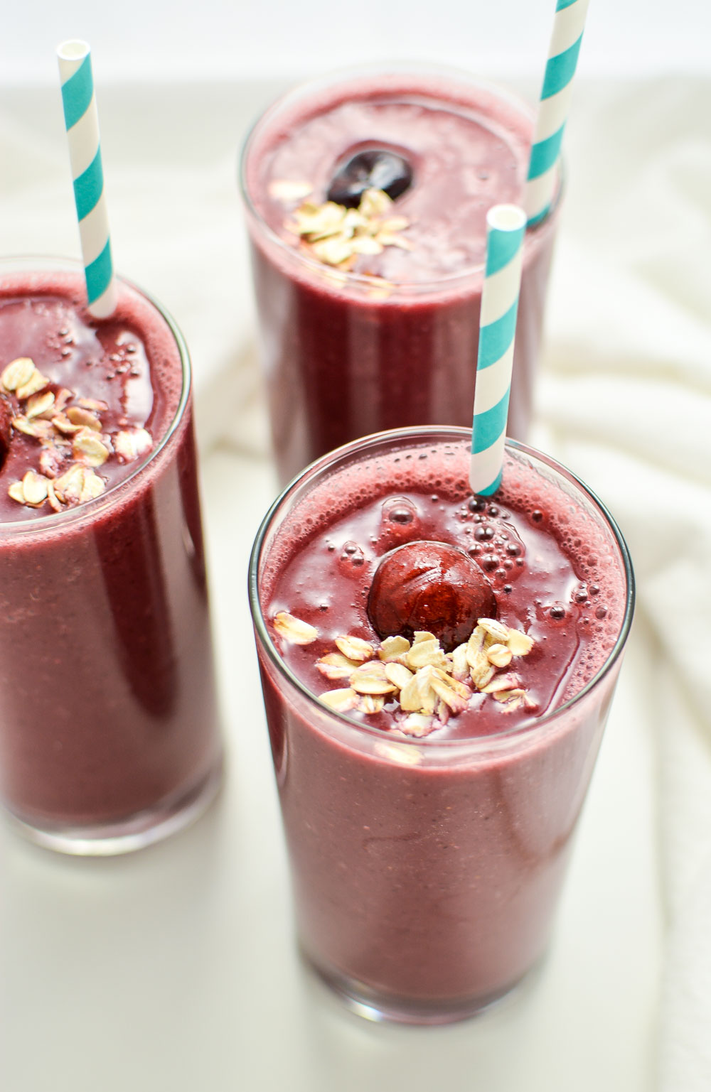 Strawberry Cherry Oatmeal Smoothies are hearty and filling, making them the perfect quick breakfast solution!