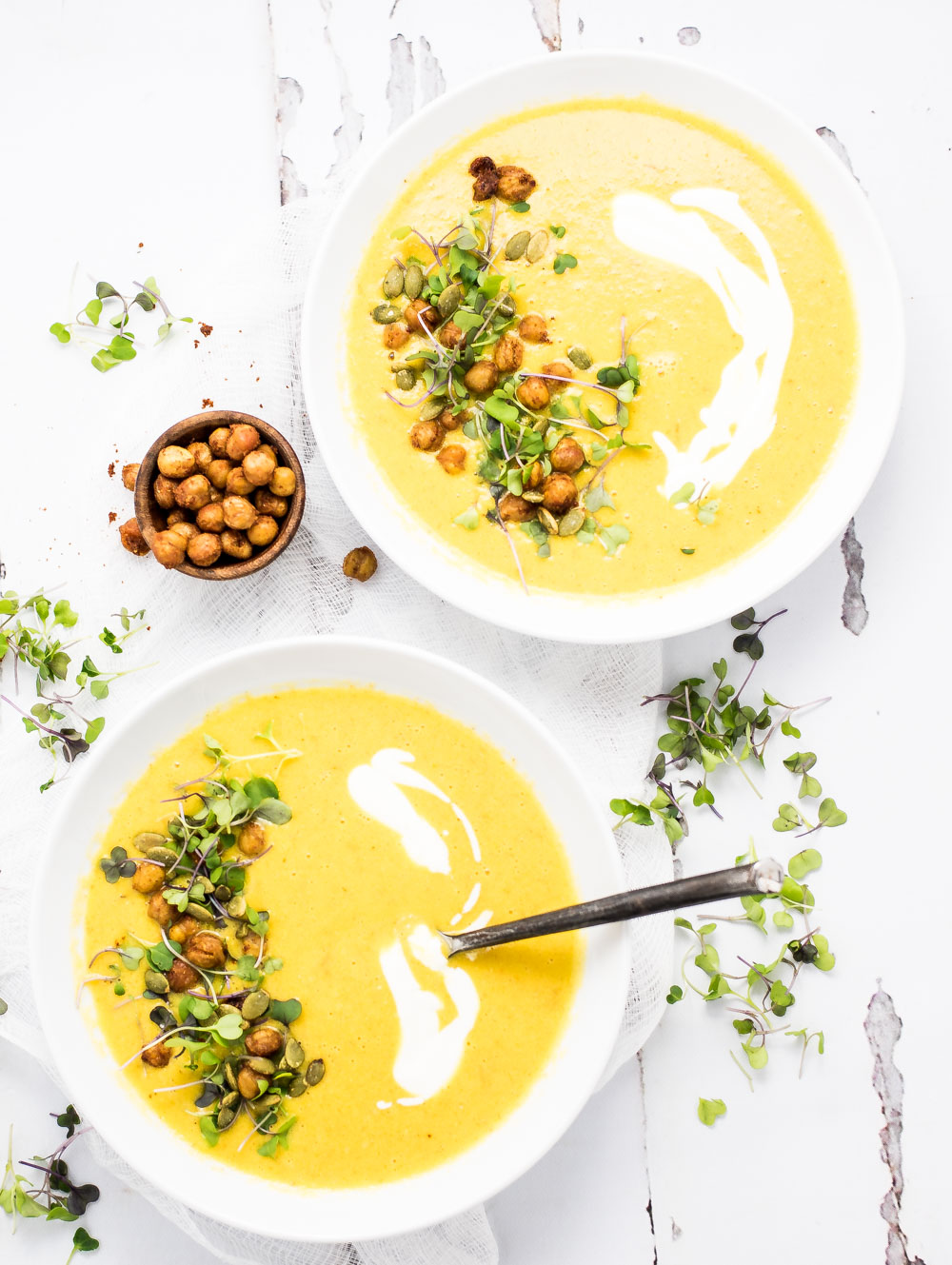 Soup isn't just for the winter! This Summer Corn and Carrot Soup with Roasted Chickpeas can be served warm or chilled and is perfect for summer!