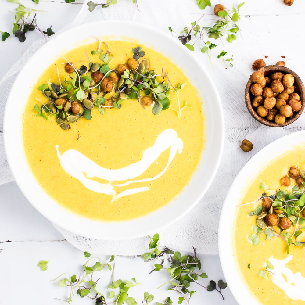 Soup isn't just for the winter! This Summer Corn and Carrot Soup with Roasted Chickpeas can be served warm or chilled and is perfect for summer!