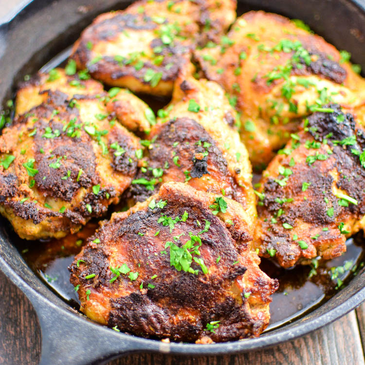 The perfect quick weeknight dinner, these crispy chicken thighs are marinated in buttermilk and tossed in a delicious spice mixture! | www.cookingandbeer.com