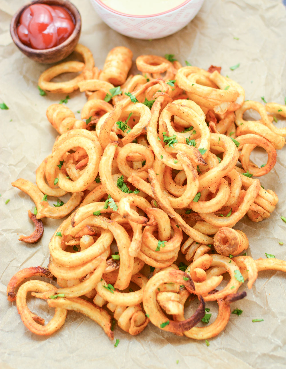 Baked Curly Fries with Mustard-BBQ Dipping Sauce are so easy to make at home and are the perfect side dish!