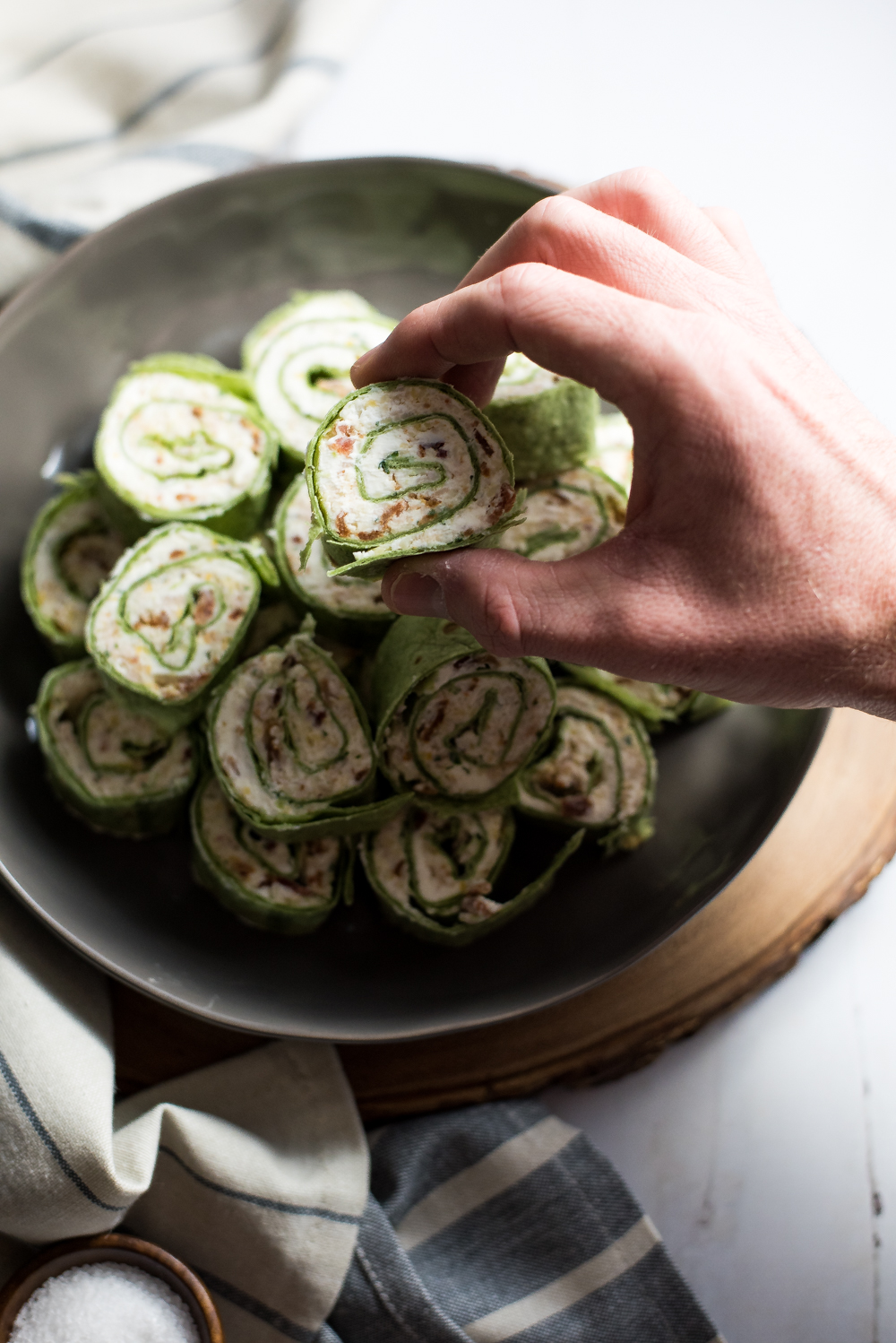 Goat cheese and honey turkey pinwheels are the perfect bite-sized snack. They are great for game day shindigs or dinner parties!
