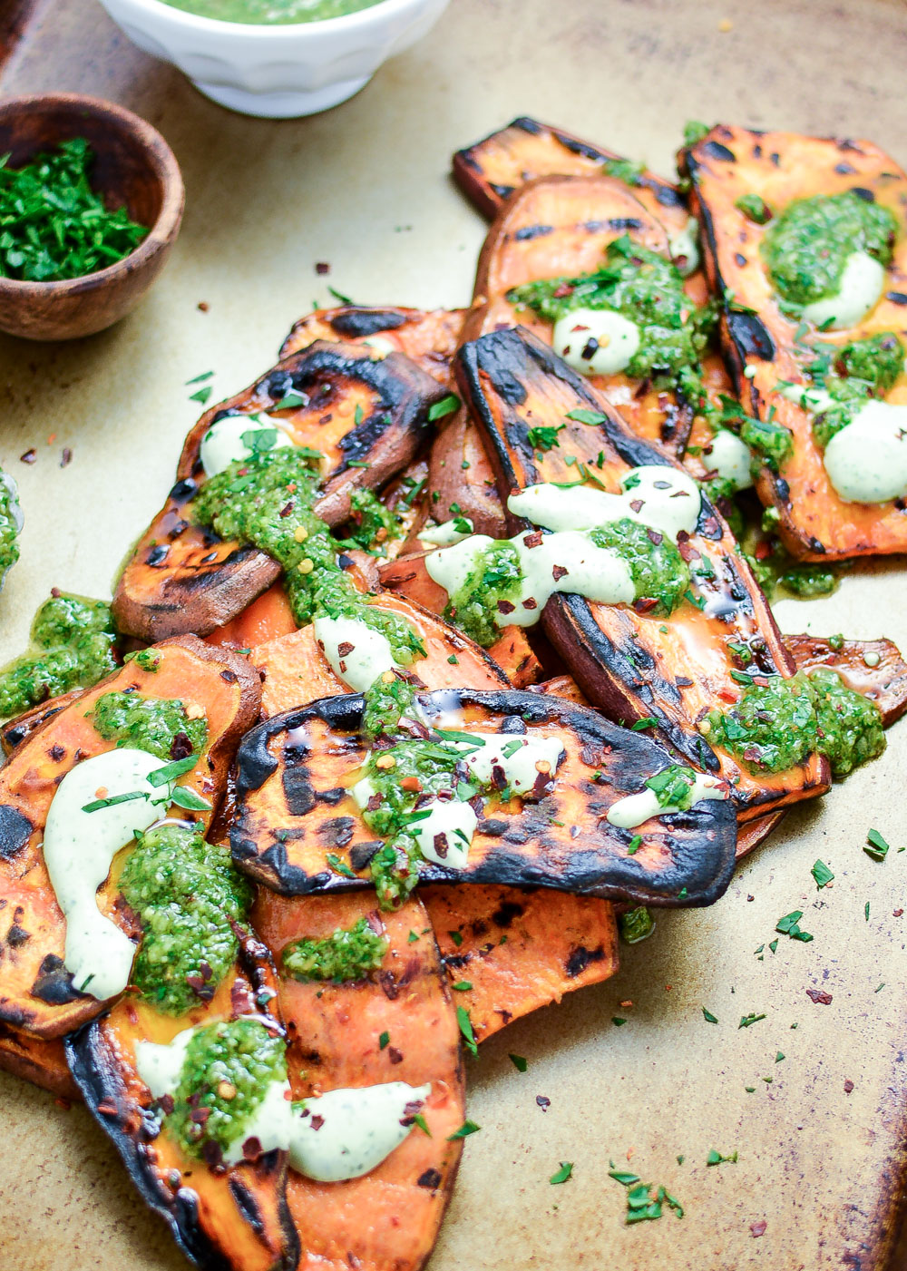 Grilled Sweet Potatoes with Cilantro Cream and Quick Chimichurri is the perfect side dish recipe to celebrate summer!