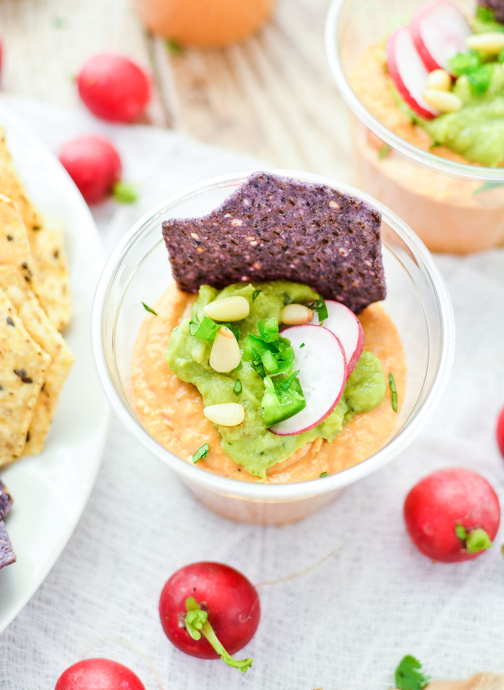 Creamy Sriracha Hummus with Simple Guacamole is the perfect dip recipe for your game day menu!