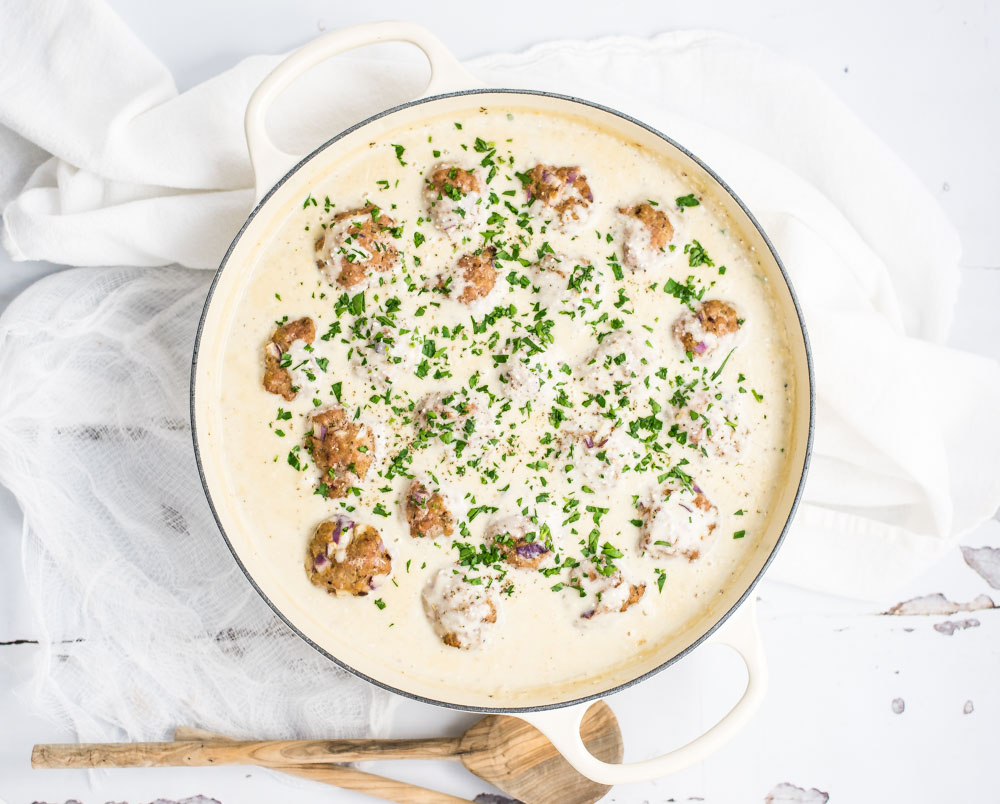 Light Almond Chicken Meatballs in Cauliflower Cream Sauce is a family-friendly weeknight meal that packs a lot of flavor, yet stays on the lighter side!