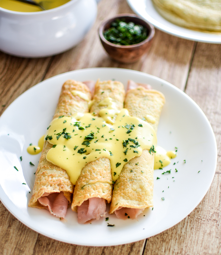 Savory Herb Crepes with Hollandaise are perfect for Easter breakfast or brunch! | www.cookingandbeer.com