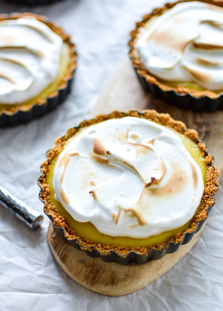 Made of an addicting lime filling and a silky meringue, these lime meringue tarts are perfect for summer! | www.cookingandbeer.com
