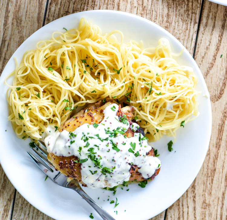 Crispy Honey Mustard Chicken Thighs with Creamy Mustard Sauce is comfort food to the max! It's a weeknight meal that's simple AND delicious! #MyMaille @MailleUS | www.cookingandbeer.com