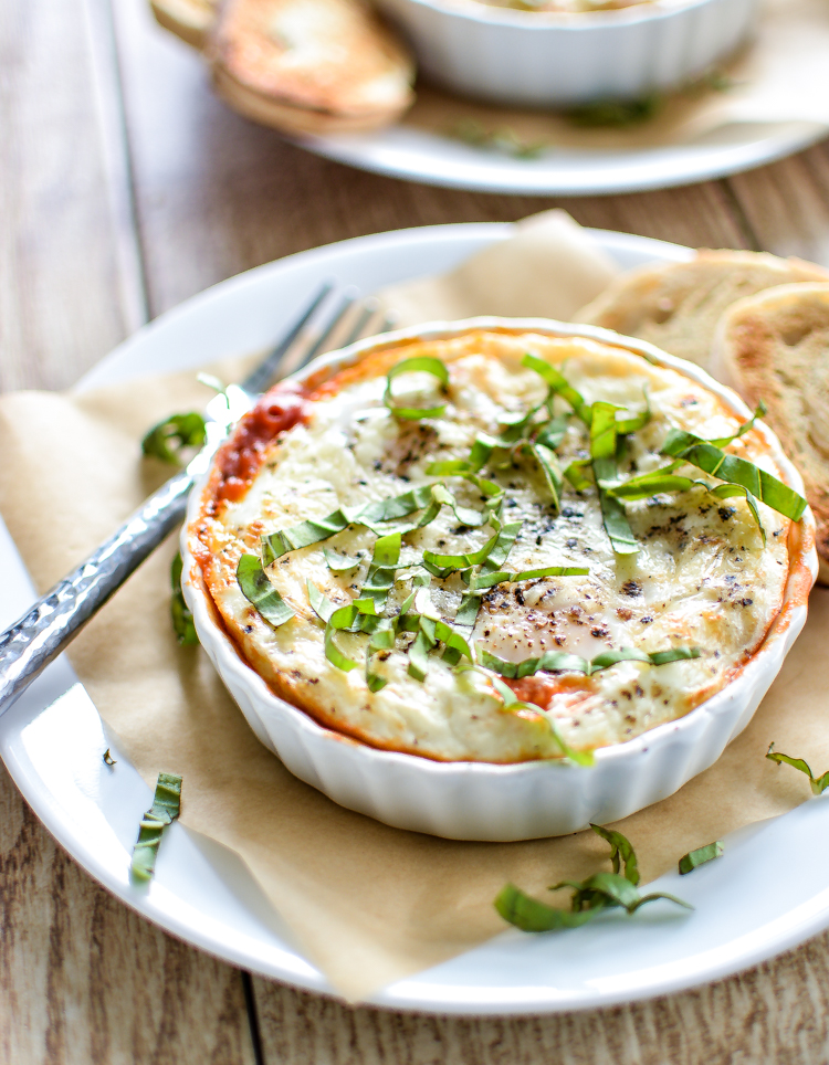 Baked Eggs and Sausage in Marinara Sauce is a perfect recipe for breakfast or brunch! | www.cookingandbeer.com