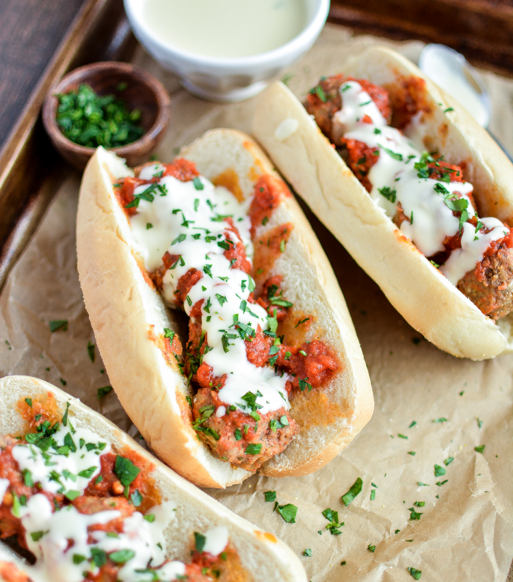 Slow Cooker Meatball Subs with Parmesan, White Cheddar Queso: a must-have recipe for you next gameday party or tailgate!