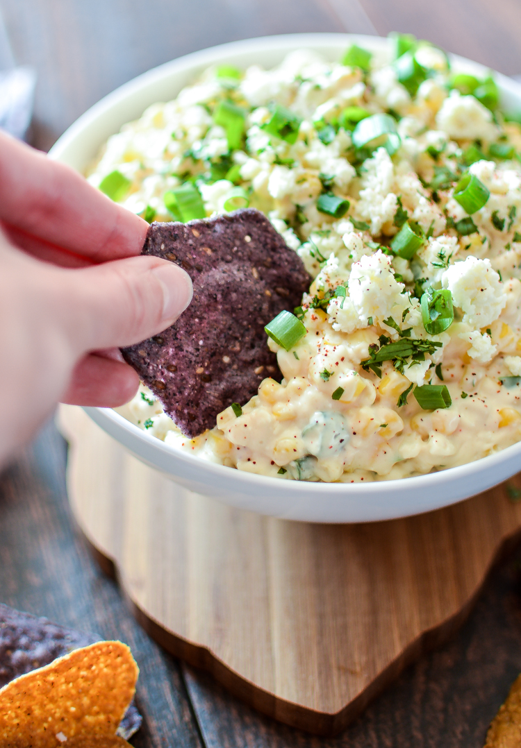 Mexican Street Corn Dip is the perfect appetizer to serve at your Cinco de Mayo party! | www.cookingandbeer.com