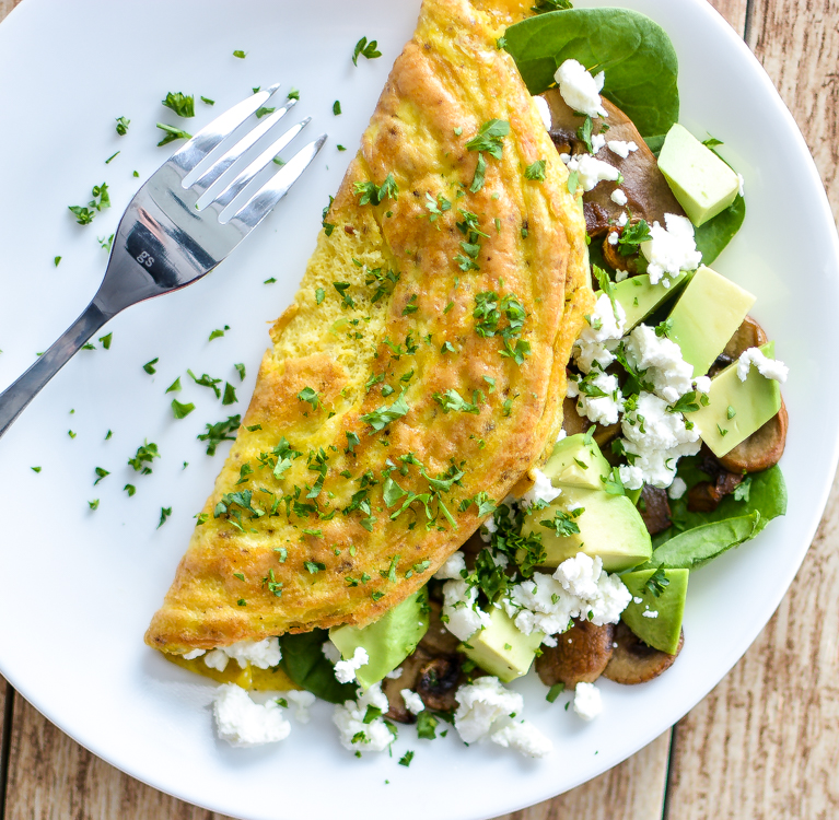 Mushroom and Goat's Cheese Omelet with Spinach and Avocado is the perfect protein-packed, gluten-free, dairy-free breakfast! | www.cookingandbeer.com