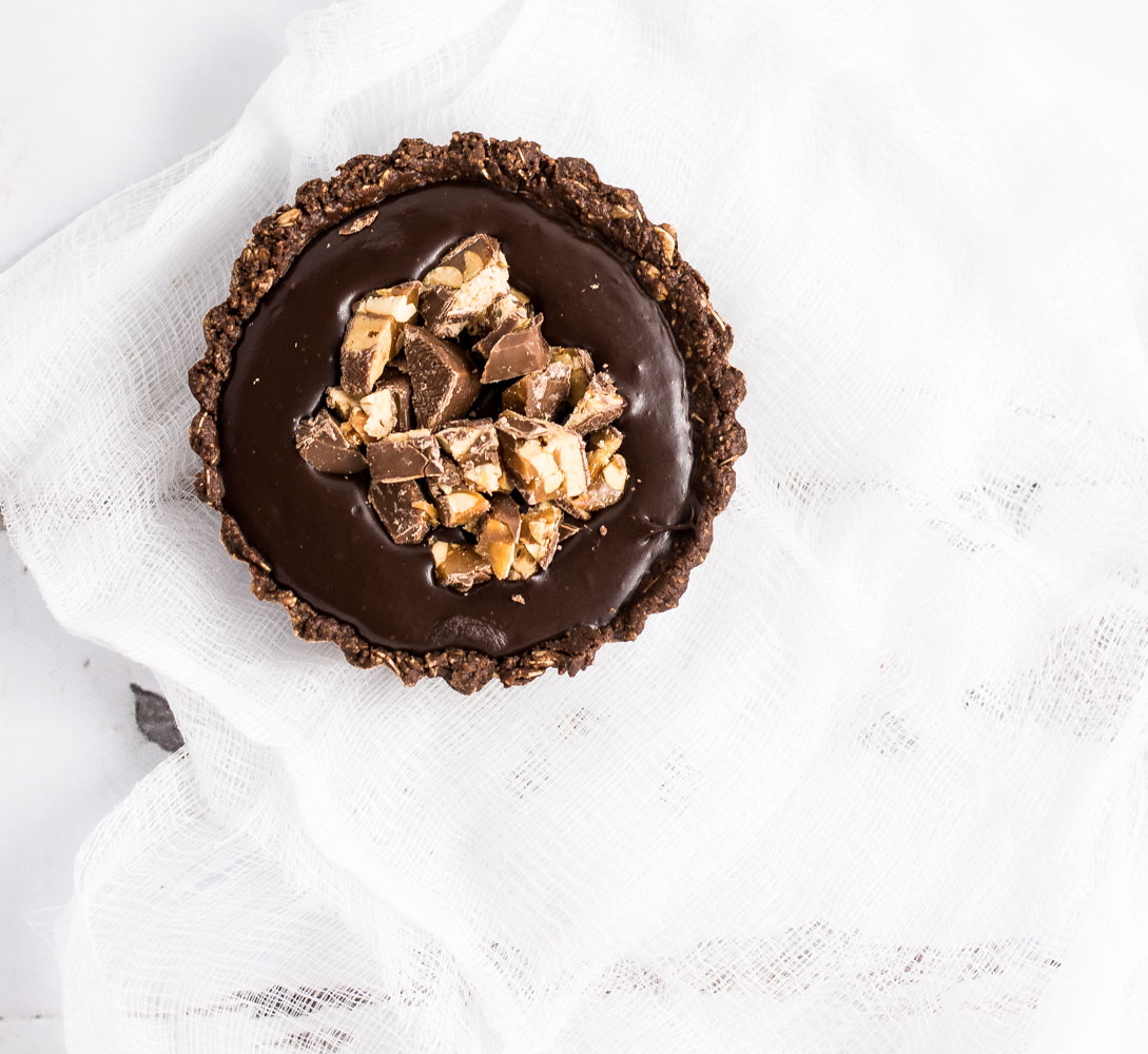 No-Bake Chocolate Snickers Tart is full of chocolatey, nutty flavor and is perfect for summer!