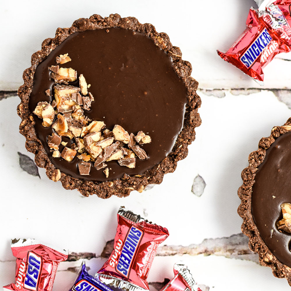 No-Bake Chocolate Snickers Tart is full of chocolatey, nutty flavor and is perfect for summer!