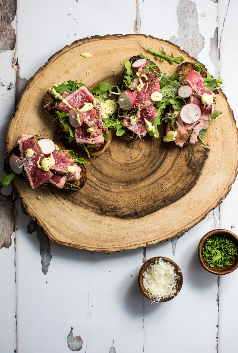 Open-Faced Steak Sandwiches with Parmesan Avocado Cream are the perfect appetizer or quick lunch recipe. Serve them at your next get together!