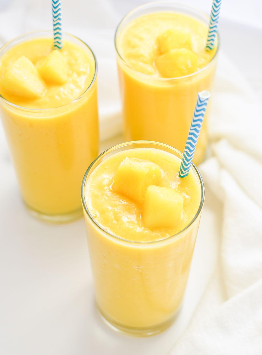 Orange pineapple smoothies are a great and refreshing way to start the day!