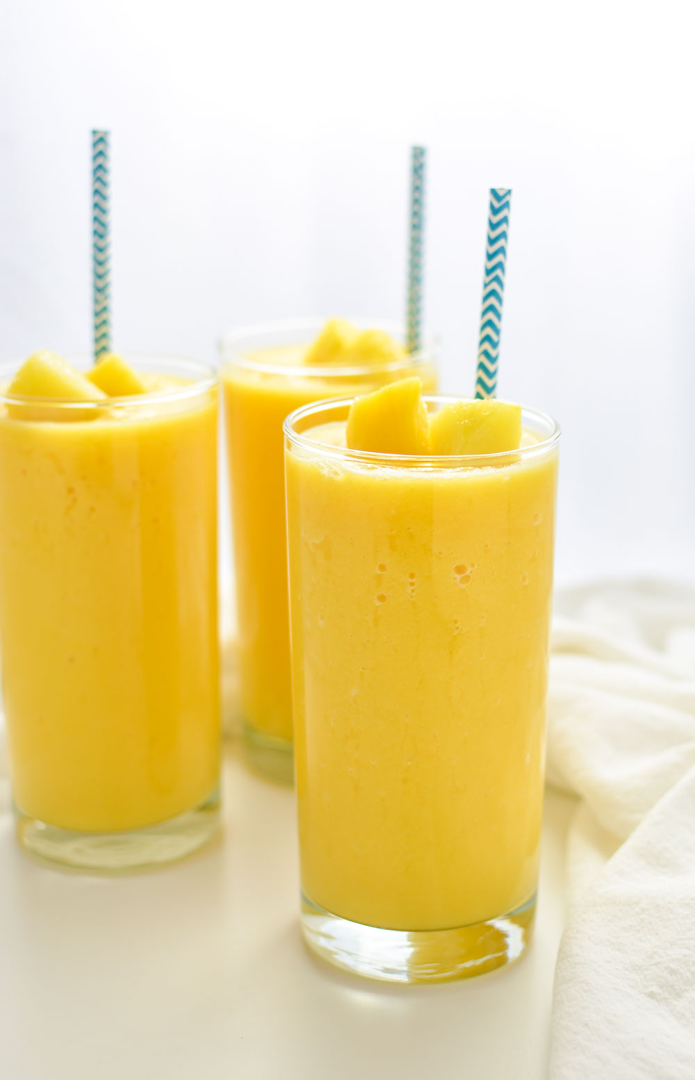 Orange pineapple smoothies are a great and refreshing way to start the day!