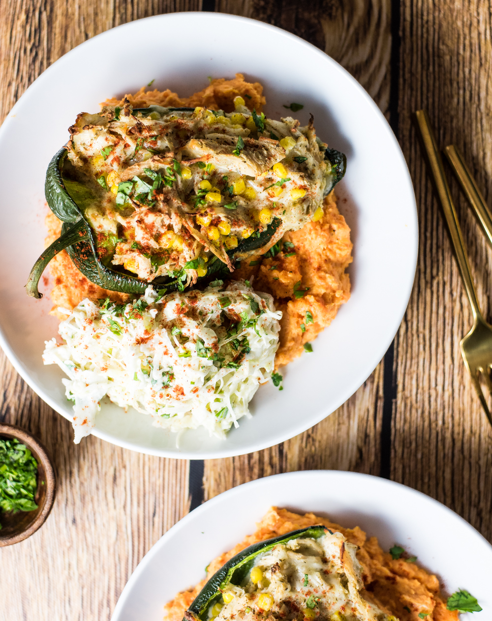 Stuffed poblano and sweet potato mash bowls are the perfect weeknight healthy recipe. It's packed full of flavor that will have you wanting more!
