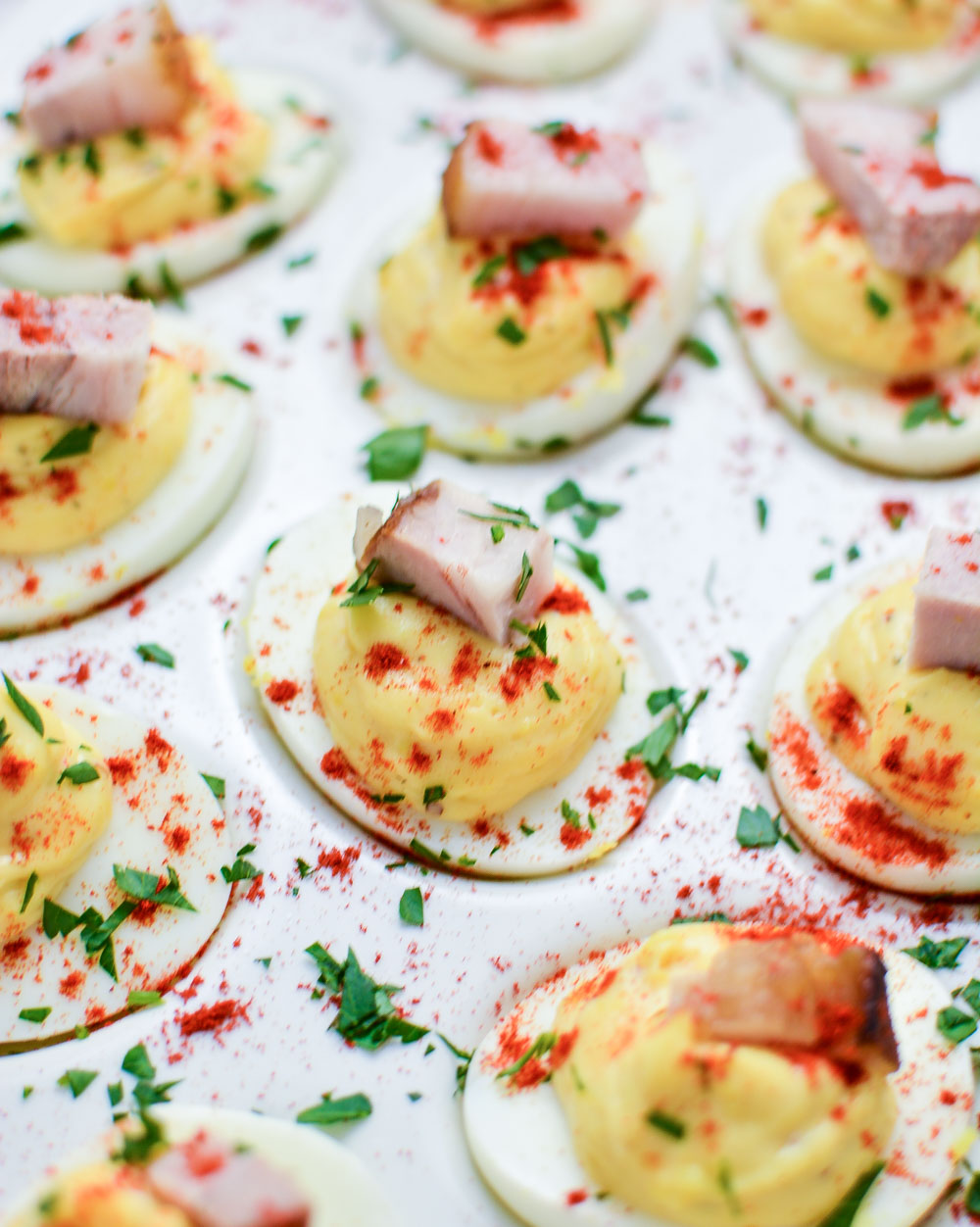 Beer-Braised Pork Belly Deviled Eggs are a must-have recipe for Easter brunch or your next spring or summer picnic!