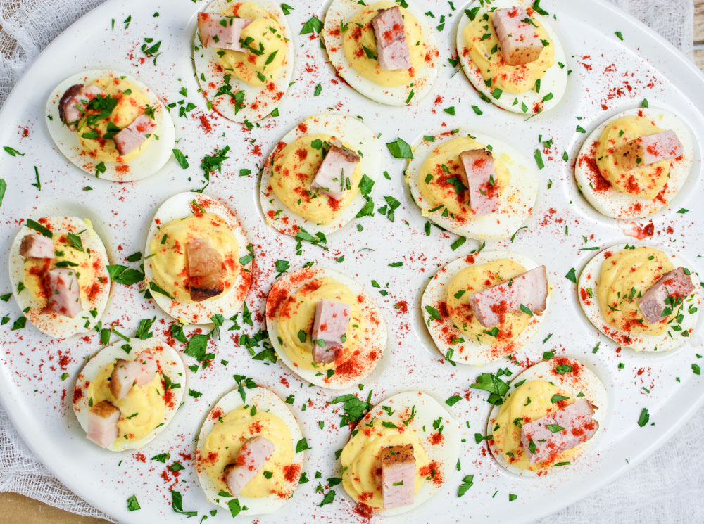 Beer-Braised Pork Belly Deviled Eggs are a must-have recipe for Easter brunch or your next spring or summer picnic!