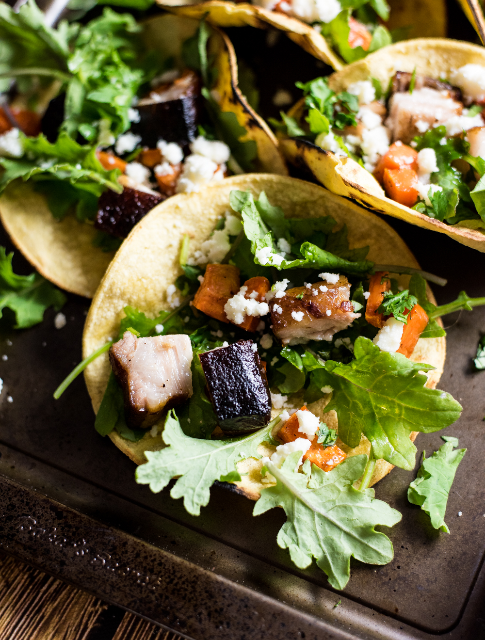 Take your taco Tuesday up a notch, and make these braised pork belly and sweet potato tacos! Crispy, tender pork belly really makes these tacos shine!