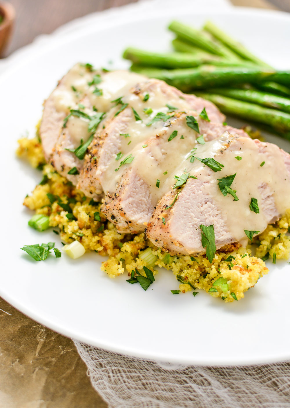 Roasted Lemon Pepper Pork Tenderloin with Cornbread Stuffing is the perfect weeknight dinner recipe that's packed with flavor!