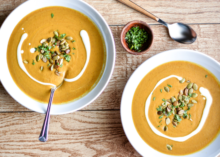 Serve this Slow Cooker Spicy and Creamy Pumpkin Soup this autumn! It's creamy, healthy, spicy...and with a dash of curry, is taken it to a whole new level!