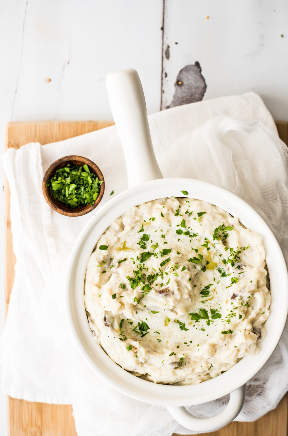 Whipped Root Vegetable Mash with Herb Beer Butter is the perfect side dish for your Thanksgiving spreads! Parsnips and turnips bring this recipe to life!
