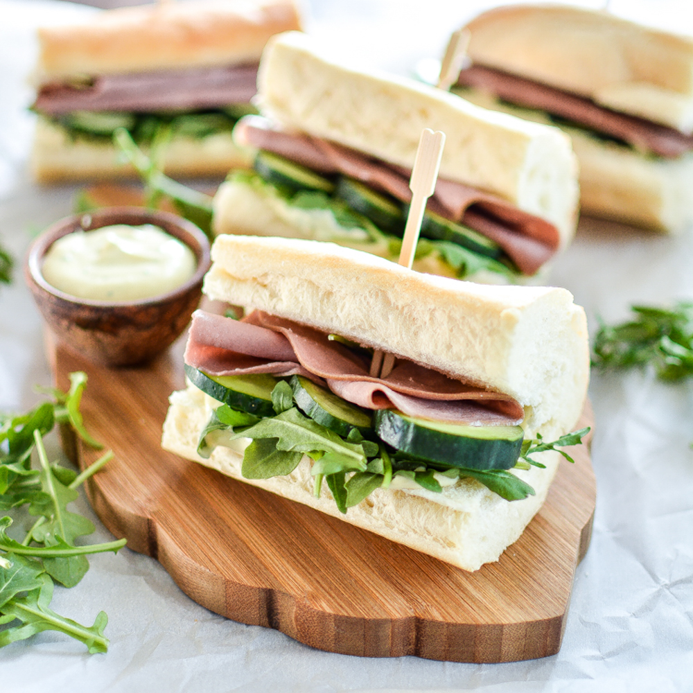 From chicken salad to baked ham and cheese and from gyros to sliders, here are 23 easy sandwich recipes that will satisfy both dinner and lunch appetites!