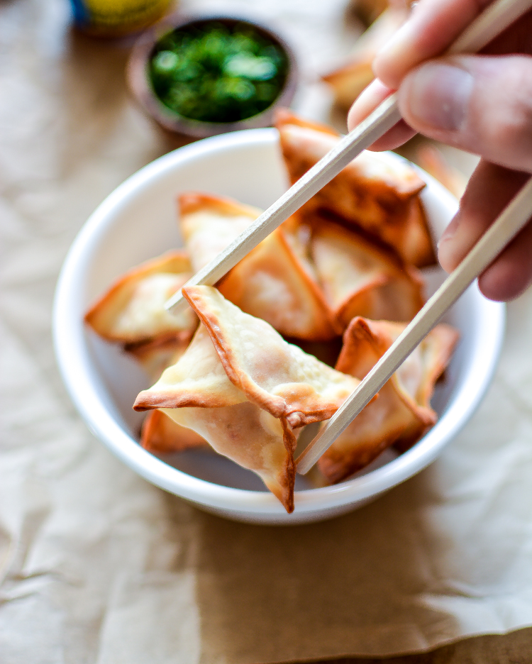 Spicy Baked Chicken Cream Cheese Wontons are a simple and delicious appetizer that needs to grace the menu of your next game day spread!