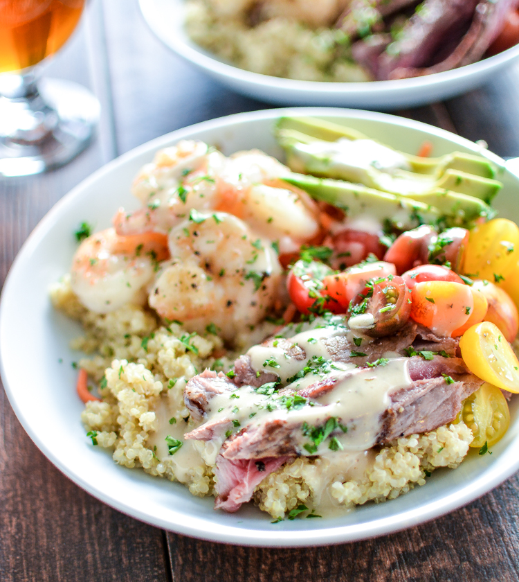 Surf and Turf Quinoa Bowls with Roasted Garlic Vinaigrette are a quick and easy weeknight dinner solution! | www.cookingandbeer.com