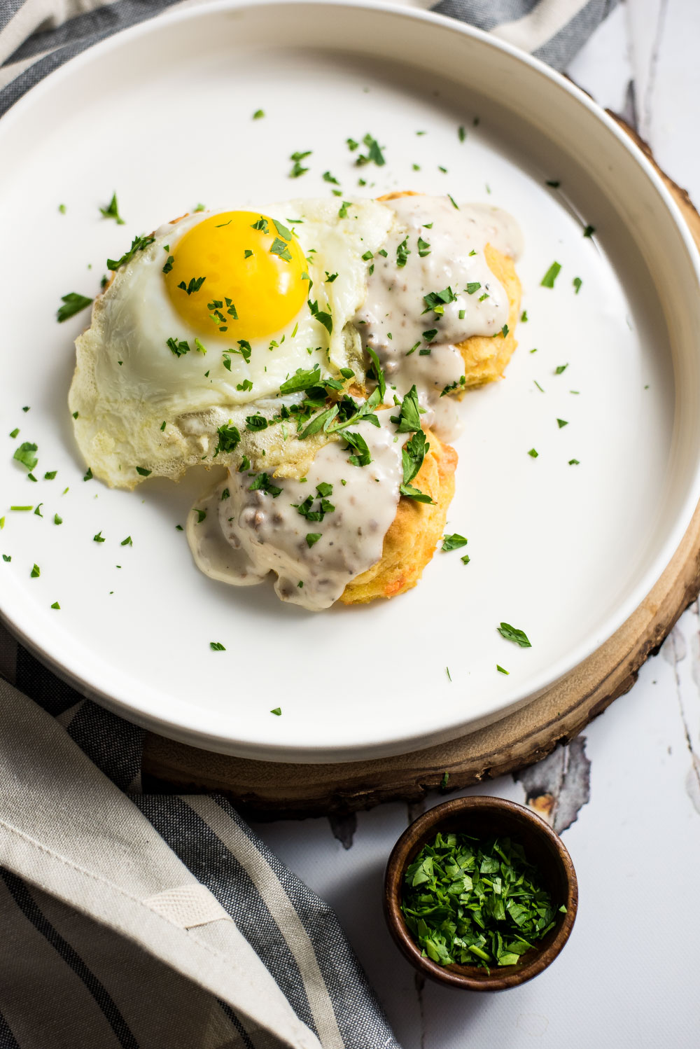 For breakfast, lunch, or dinner, these quick and simple sweet potato biscuits and gravy are a snap to whip up, super delicious, and insanely comforting!