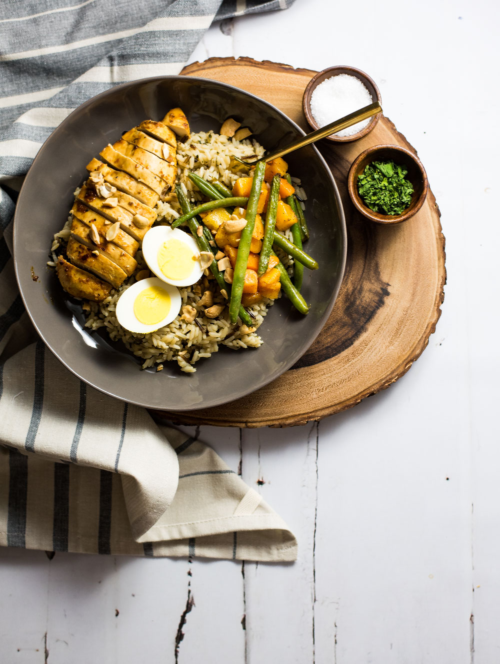 Brown Butter rice bowls with marinated chicken breast and roasted veggies is the perfect family-friendly weeknight meal that's loaded with nutritious deliciousness!