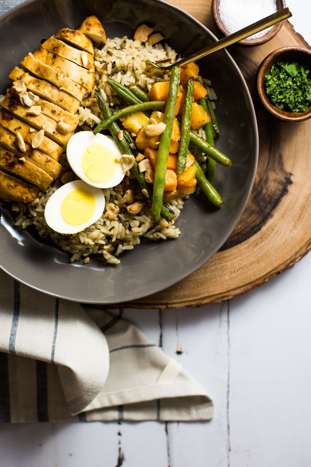 Brown Butter rice bowls with marinated chicken breast and roasted veggies is the perfect family-friendly weeknight meal that's loaded with nutritious deliciousness!