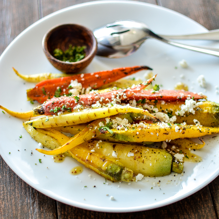 Za'atar Grilled Carrots are the perfect summer side dish that is loaded with spice and flavor! | www.cookingandbeer.com