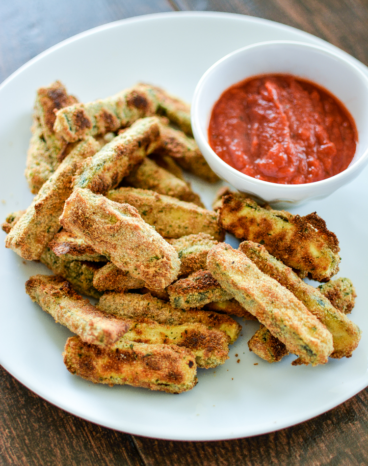 Almond-Crusted Zucchini Sticks are gluten-free and dairy-free. They are the perfect afternoon snack, quick lunch or weeknight dinner recipe! | www.cookingandbeer.com